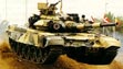 Основной танк Т-90 на трамплине.